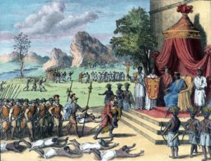un_roi_du_congo_tronant_sur_son_estrade_recoit_une_delegation_de_portugais_au_xvie_siecle_gravure_a_partir_dun_original_de_theodore_de_bry_1000x764-e1446337614350